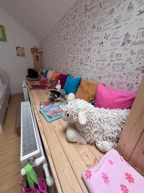 Postel nebo postele na pokoji v ubytování Casa Trandafirilor