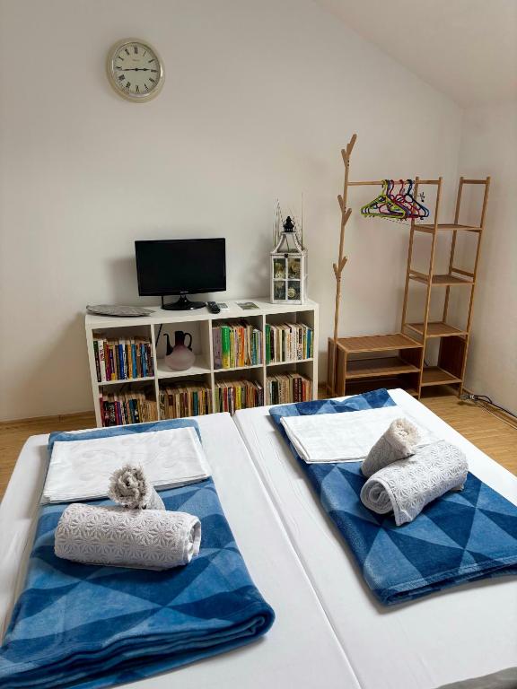 Postel nebo postele na pokoji v ubytování Casa Trandafirilor