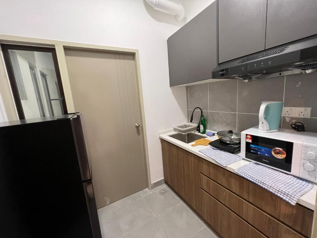 A cozinha ou cozinha compacta de C-10-04 - 2 Room - Youth City - Nilai - Infinity pool