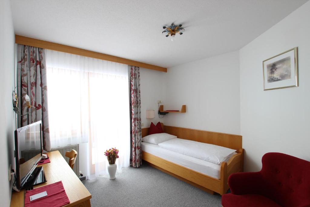Postel nebo postele na pokoji v ubytování Hotel Garni Bel-Ami