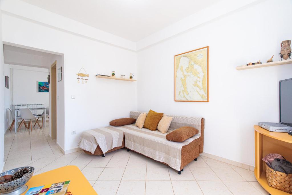 Televízia a/alebo spoločenská miestnosť v ubytovaní Apartment TODOR