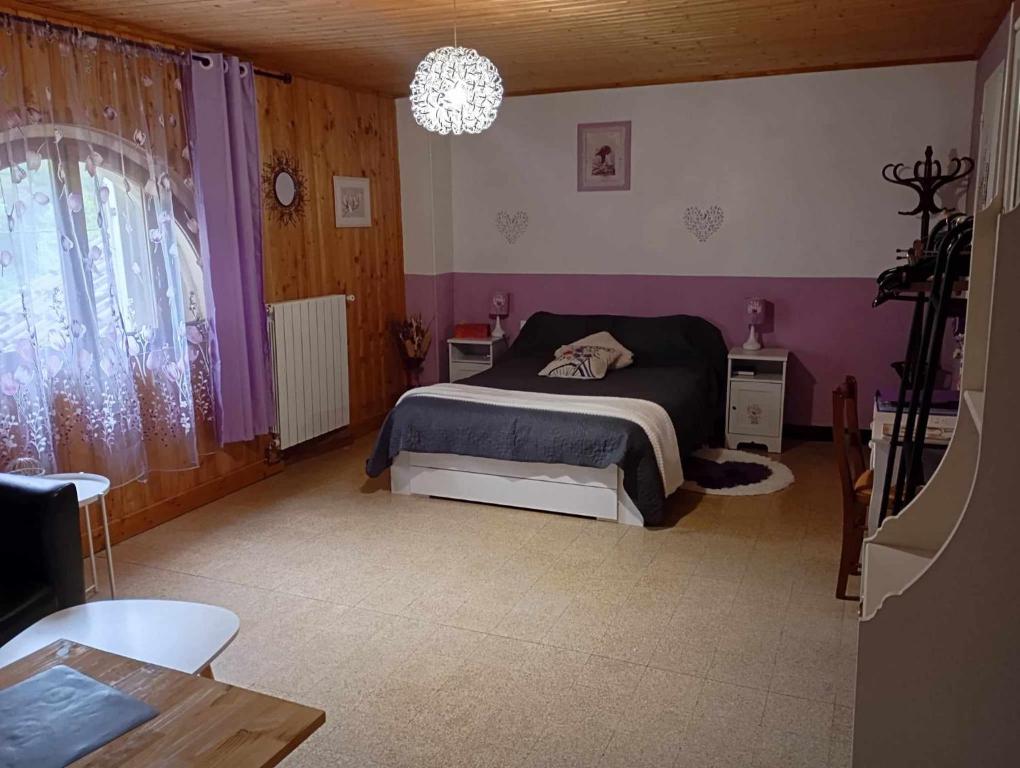 Postel nebo postele na pokoji v ubytování Le Clos du Cèdre