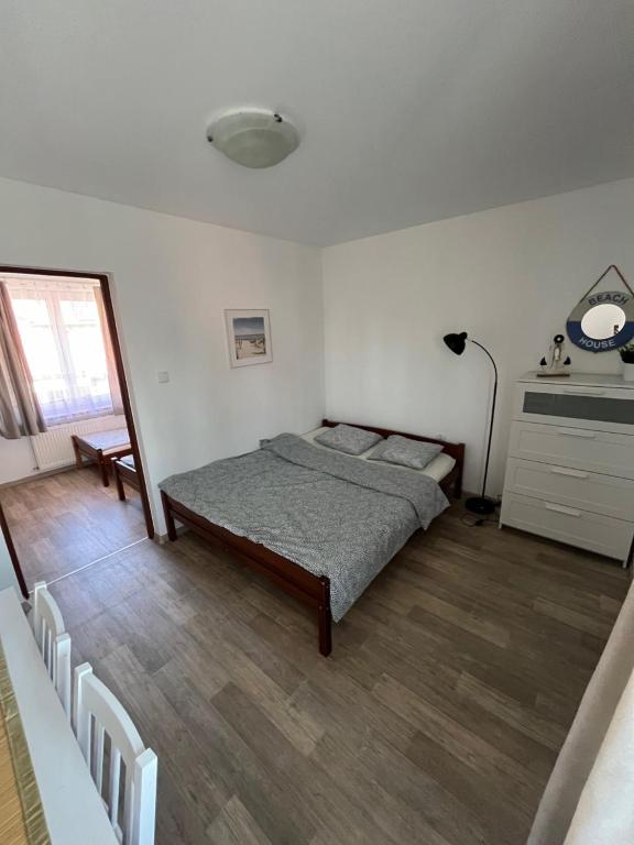 Postel nebo postele na pokoji v ubytování Ranczo u Korby