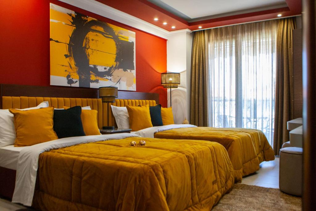 Postel nebo postele na pokoji v ubytování Art Hotel Aronos