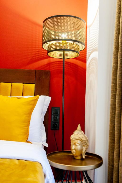 Postel nebo postele na pokoji v ubytování Art Hotel Aronos