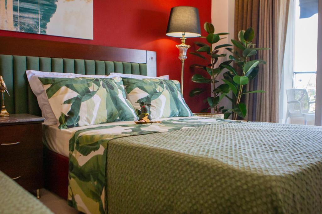 Postel nebo postele na pokoji v ubytování Art Hotel Aronos