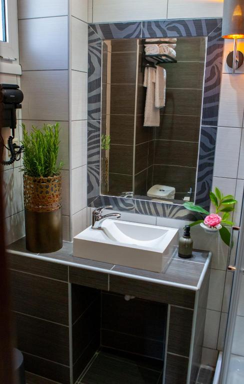 Koupelna v ubytování Art Hotel Aronos