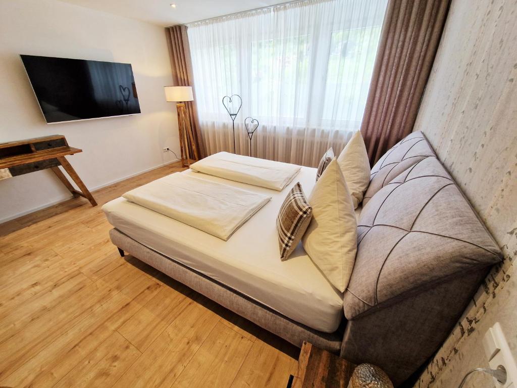 TV a/nebo společenská místnost v ubytování Landgasthof Rebstock