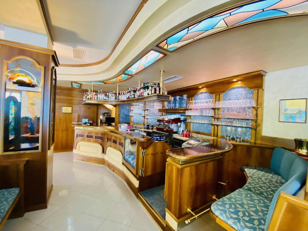 TV a/nebo společenská místnost v ubytování Hotel Ideal