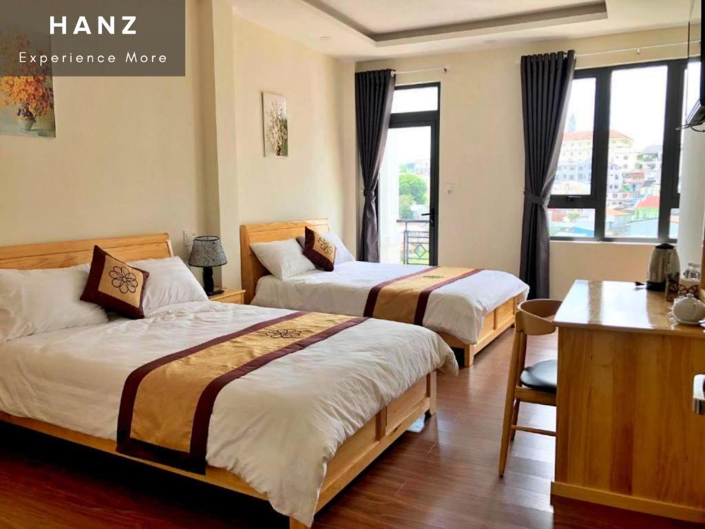 Postel nebo postele na pokoji v ubytování S79 Hoa Dang Hotel