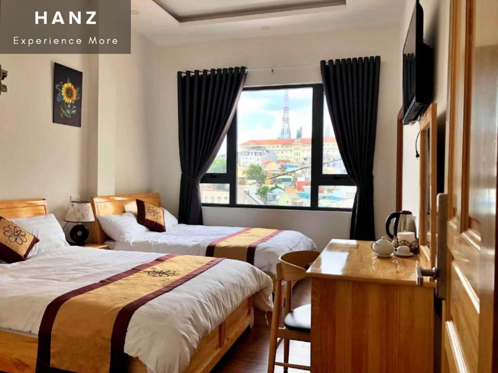 Postel nebo postele na pokoji v ubytování S79 Hoa Dang Hotel