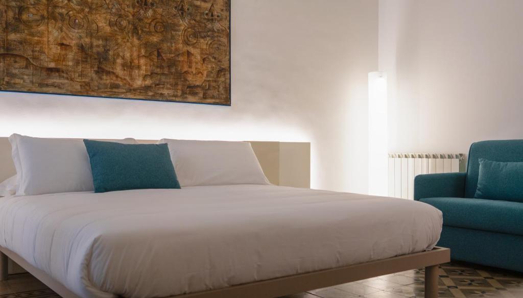 Postel nebo postele na pokoji v ubytování Ottanta5 Private Rooms