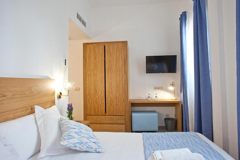 Posteľ alebo postele v izbe v ubytovaní Boutique Hotel Petit Sant Miquel