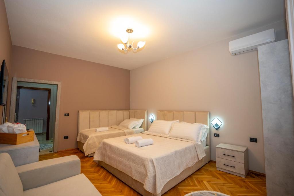 Postel nebo postele na pokoji v ubytování Hotel Pepe