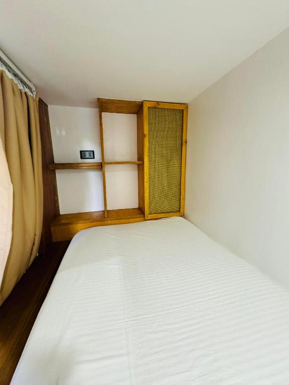 Postel nebo postele na pokoji v ubytování Casavia Siargao