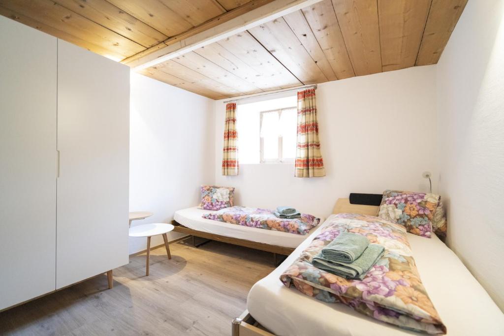 Postel nebo postele na pokoji v ubytování Chasa Capricorn Sent