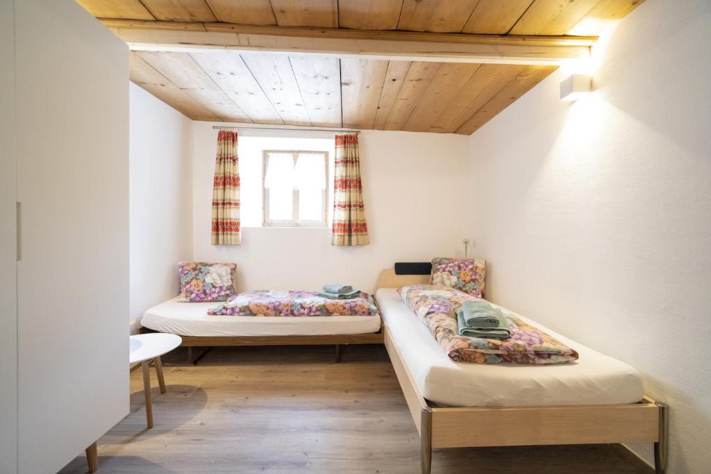 Postel nebo postele na pokoji v ubytování Chasa Capricorn Sent