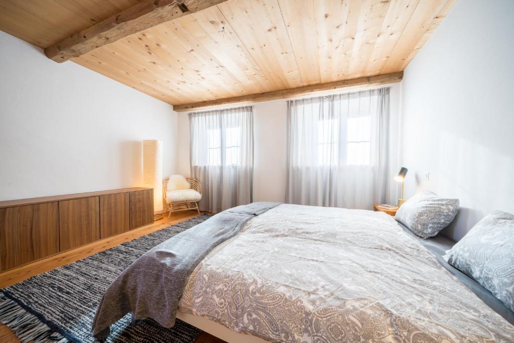 Postel nebo postele na pokoji v ubytování Chasa Pro la Tuor