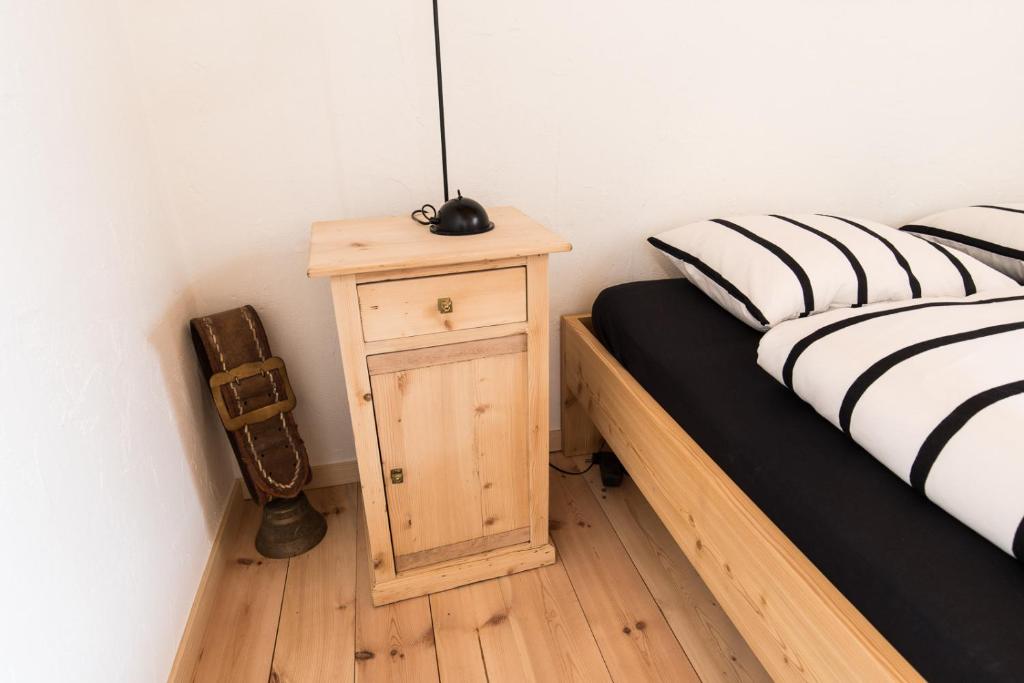 Postel nebo postele na pokoji v ubytování Chasa La Tschuffa