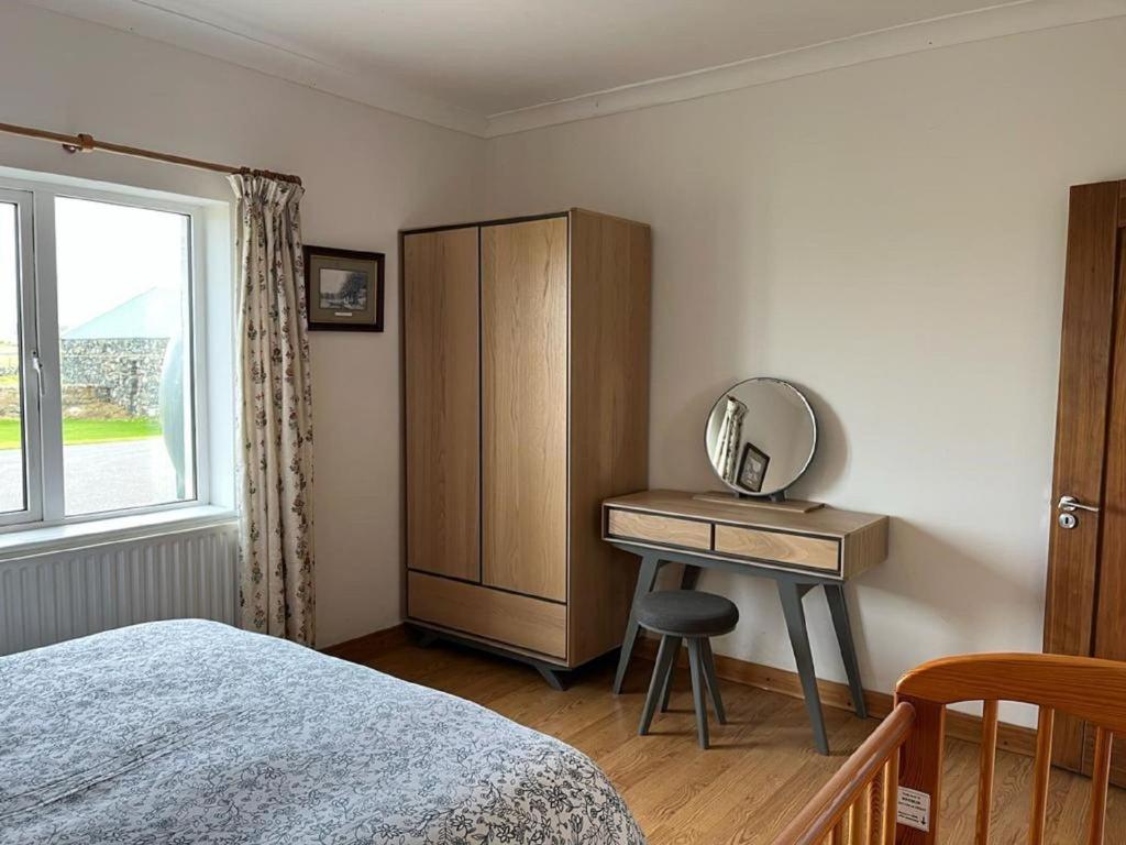 Postel nebo postele na pokoji v ubytování Foregloss Cottage