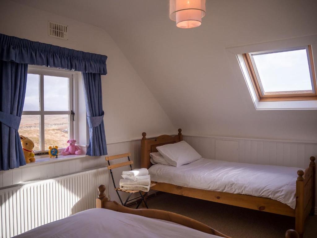 Postel nebo postele na pokoji v ubytování 14 Leitirshask, Ballyconneely
