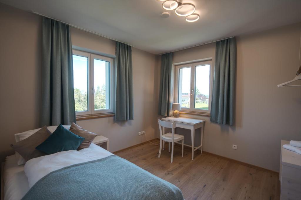 Postel nebo postele na pokoji v ubytování Traumhaftes Ferienhaus am Lateinberg - 8455 Eibiswald Südsteiermark
