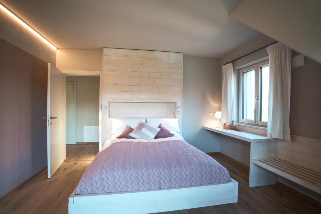 Postel nebo postele na pokoji v ubytování Traumhaftes Ferienhaus am Lateinberg - 8455 Eibiswald Südsteiermark