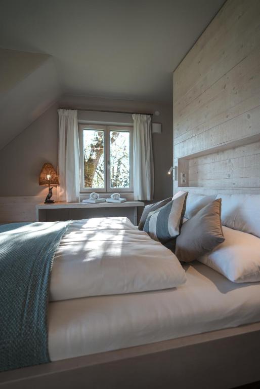 Postel nebo postele na pokoji v ubytování Traumhaftes Ferienhaus am Lateinberg - 8455 Eibiswald Südsteiermark