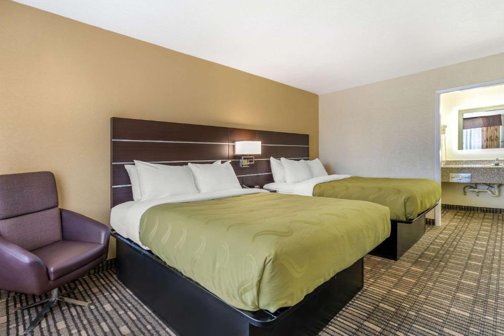 Postel nebo postele na pokoji v ubytování Quality Inn Tucumcari