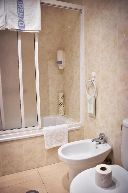 Kúpeľňa v ubytovaní HOTEL LORENZO