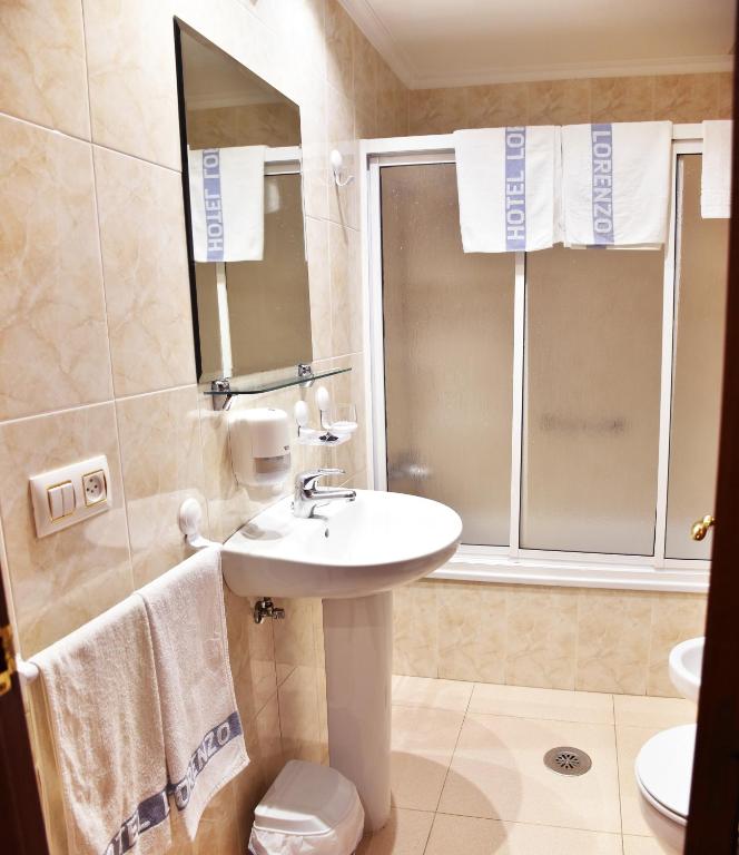 Kúpeľňa v ubytovaní HOTEL LORENZO
