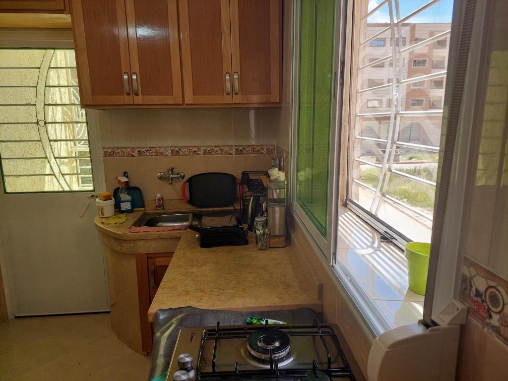 Kuchyň nebo kuchyňský kout v ubytování Hi Home