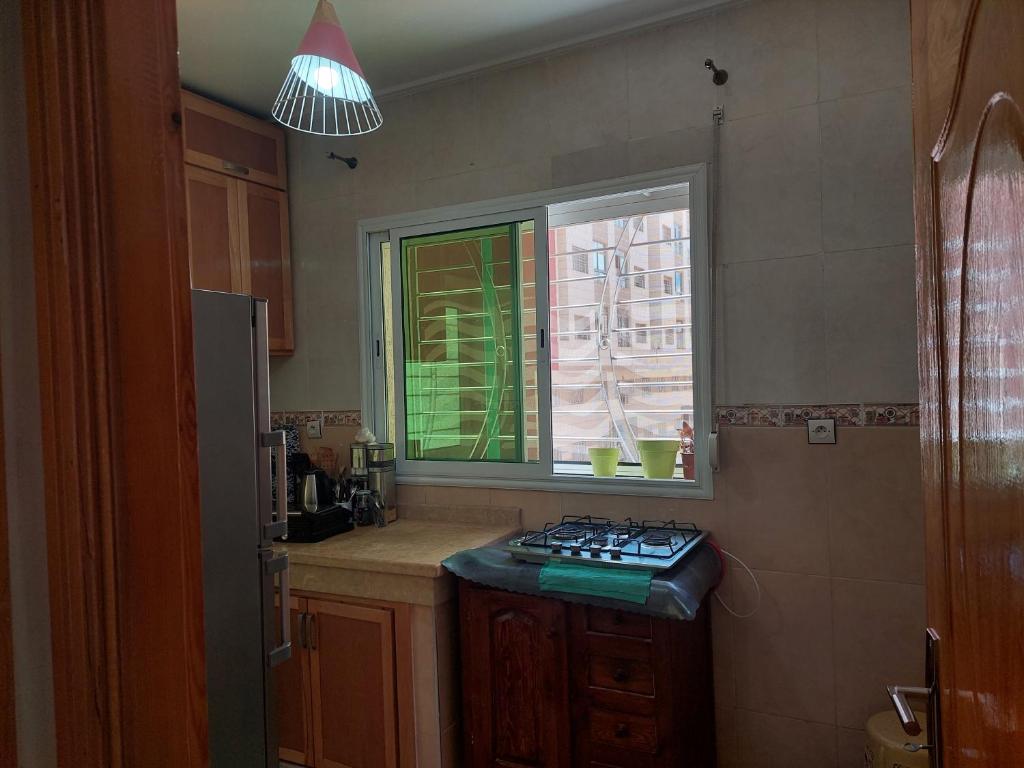 Kuchyň nebo kuchyňský kout v ubytování Hi Home