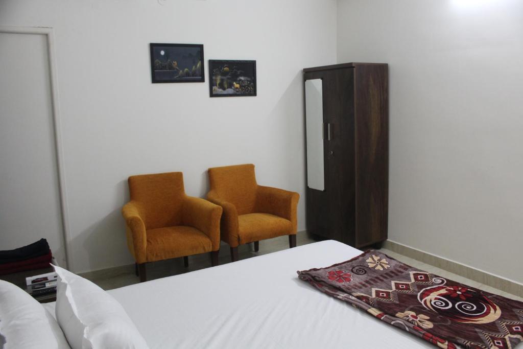 Postel nebo postele na pokoji v ubytování Friendlystay Prime