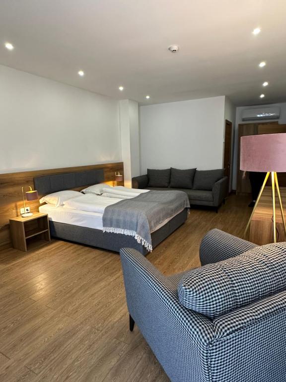 Postel nebo postele na pokoji v ubytování Hotel Homey Kobuleti