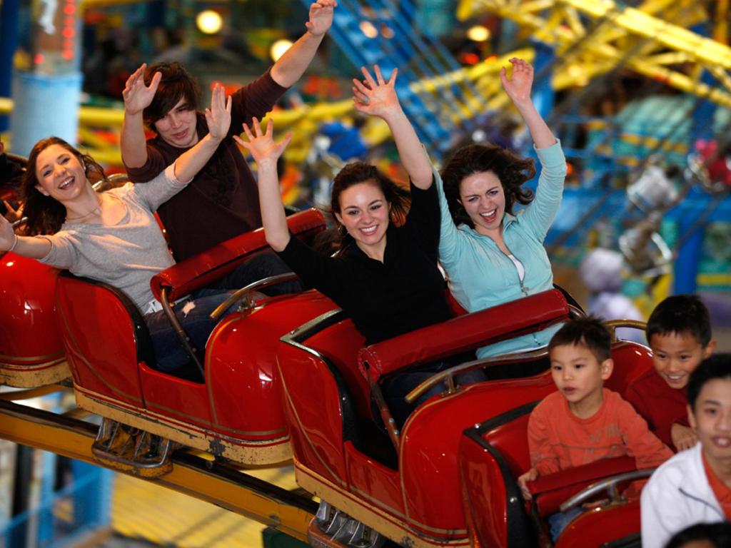 a group of people riding on a roller coaster at West Edmonton Mall Inn in Edmonton
