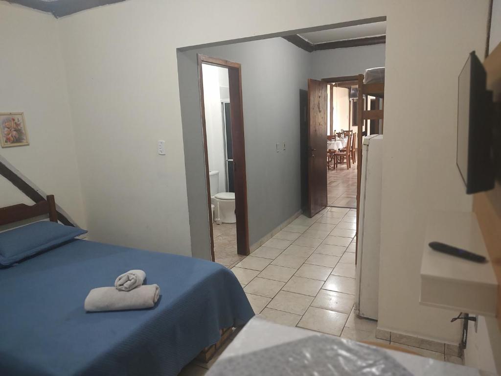 Cama ou camas em um quarto em Pousada Martin Pescador Bombinhas