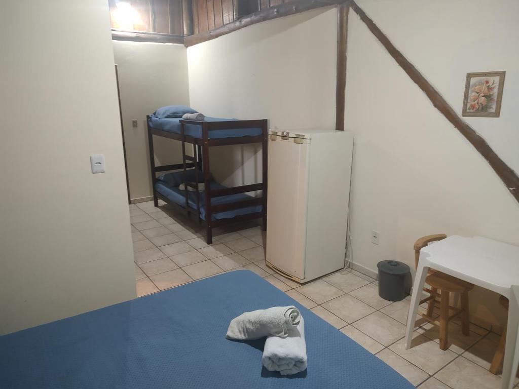 Cama ou camas em um quarto em Pousada Martin Pescador Bombinhas