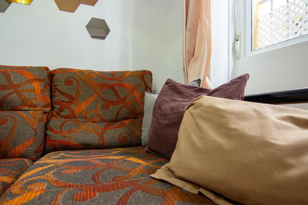 Część wypoczynkowa w obiekcie RentalSevilla Apartamento encantador en el Gran Poder