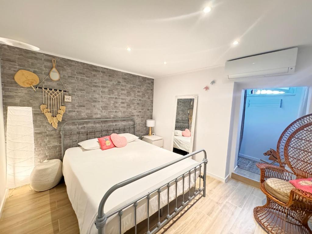 Postel nebo postele na pokoji v ubytování Apartamento Ponte 25 Abril