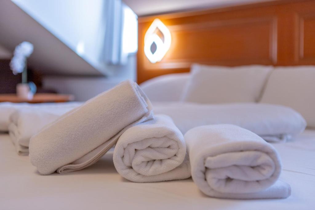 Posteľ alebo postele v izbe v ubytovaní Szinbád Hotel