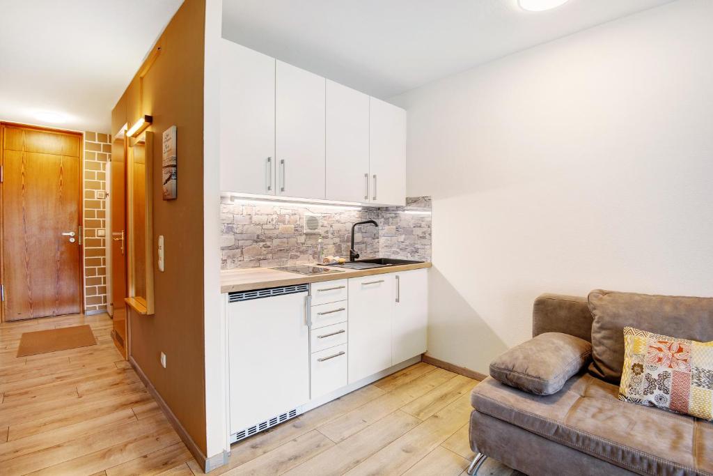 Kuchyň nebo kuchyňský kout v ubytování Ferienappartement Waldgenuss