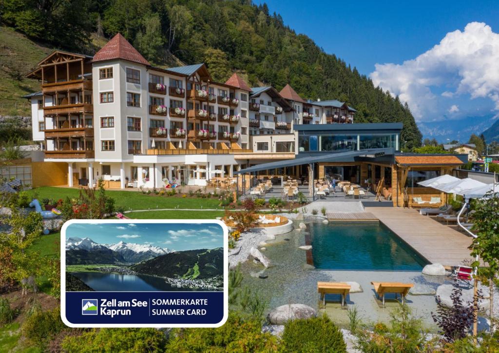 a picture of a hotel with a swimming pool at Superior Sport und Familienresort Alpenblick in Zell am See
