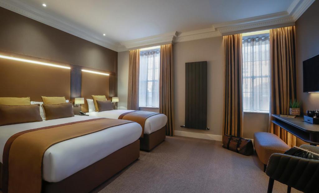 Ένα ή περισσότερα κρεβάτια σε δωμάτιο στο Belvedere Hotel, Dublin City Centre