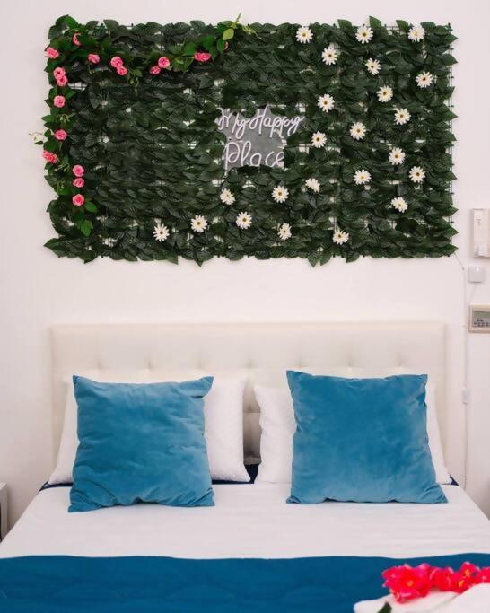 Łóżko lub łóżka w pokoju w obiekcie Davids Room Palazzo Tamborino