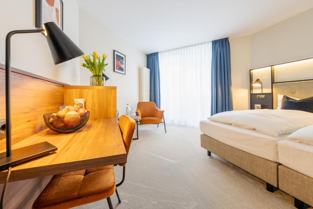 Postel nebo postele na pokoji v ubytování SOLTHUS Hotel&SPA