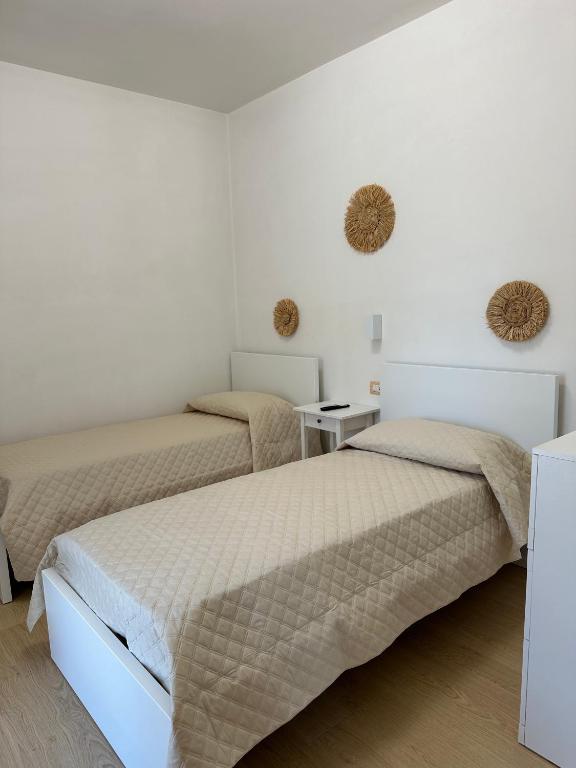 Postel nebo postele na pokoji v ubytování Li Mori Rooms