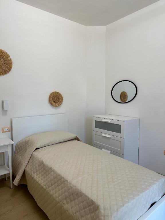 Postel nebo postele na pokoji v ubytování Li Mori Rooms