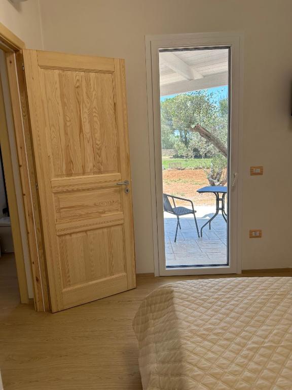 Postel nebo postele na pokoji v ubytování Li Mori Rooms