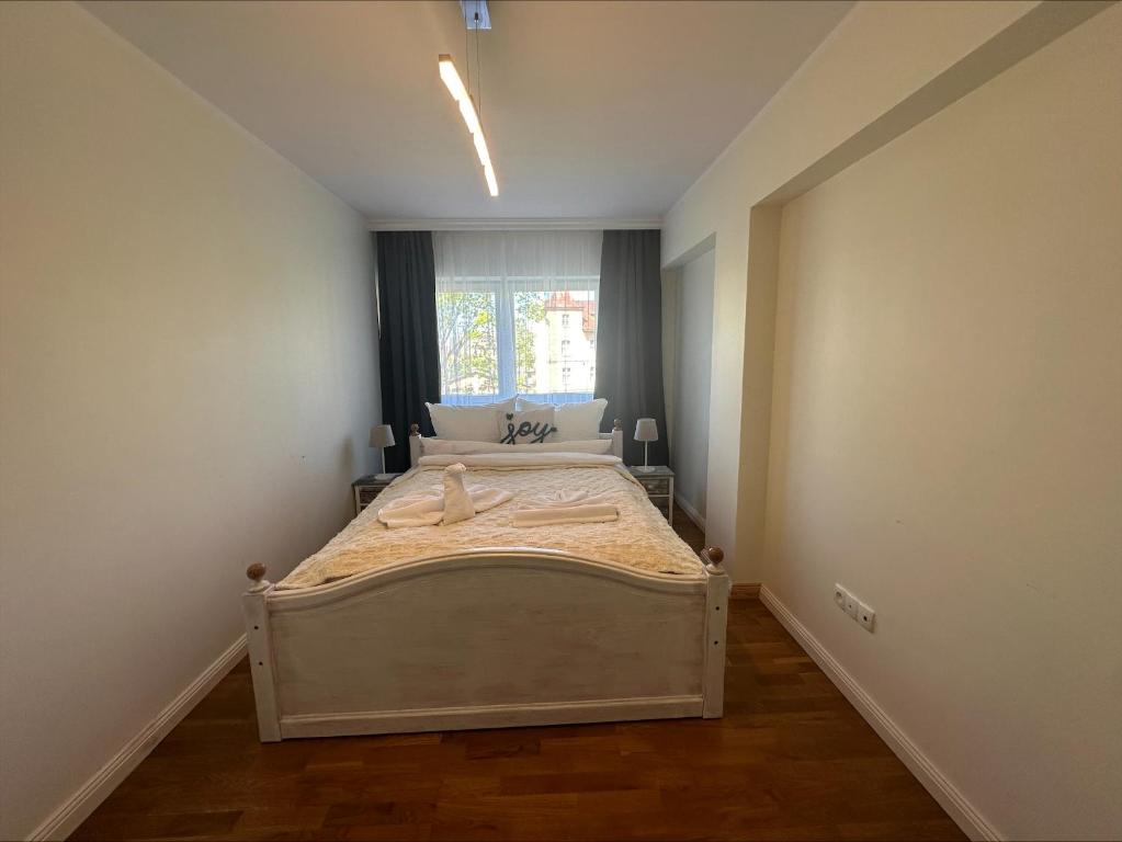 Posteľ alebo postele v izbe v ubytovaní Villa Park by Baltic Home